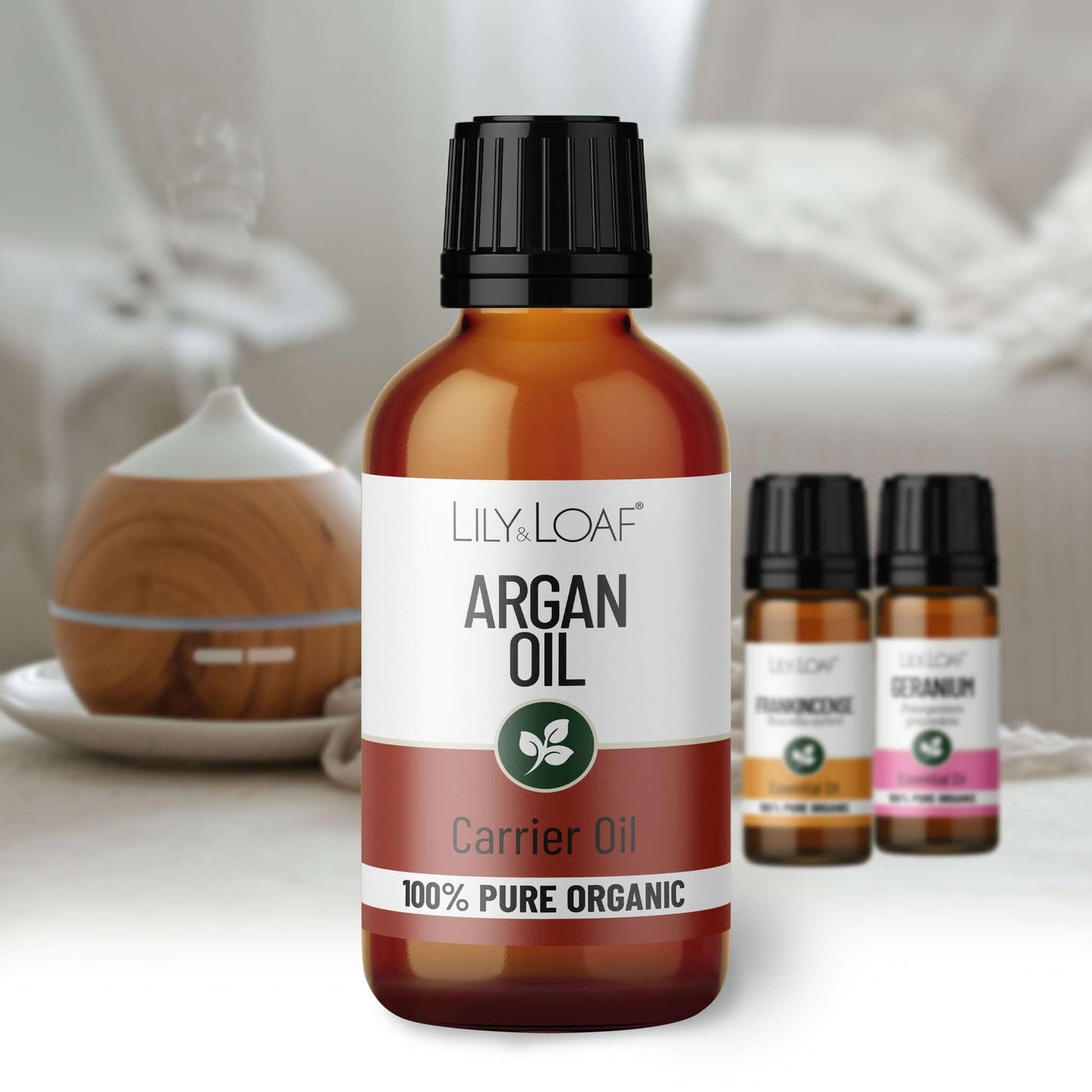 Bottle of Lily & Loaf Argan Oil with other small bottles in the background