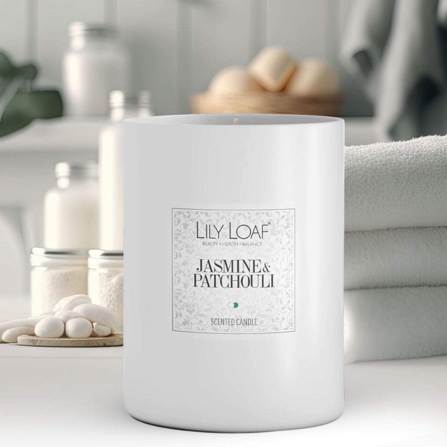 Jasmine & Patchouli Soy Wax Candle in a bathroom