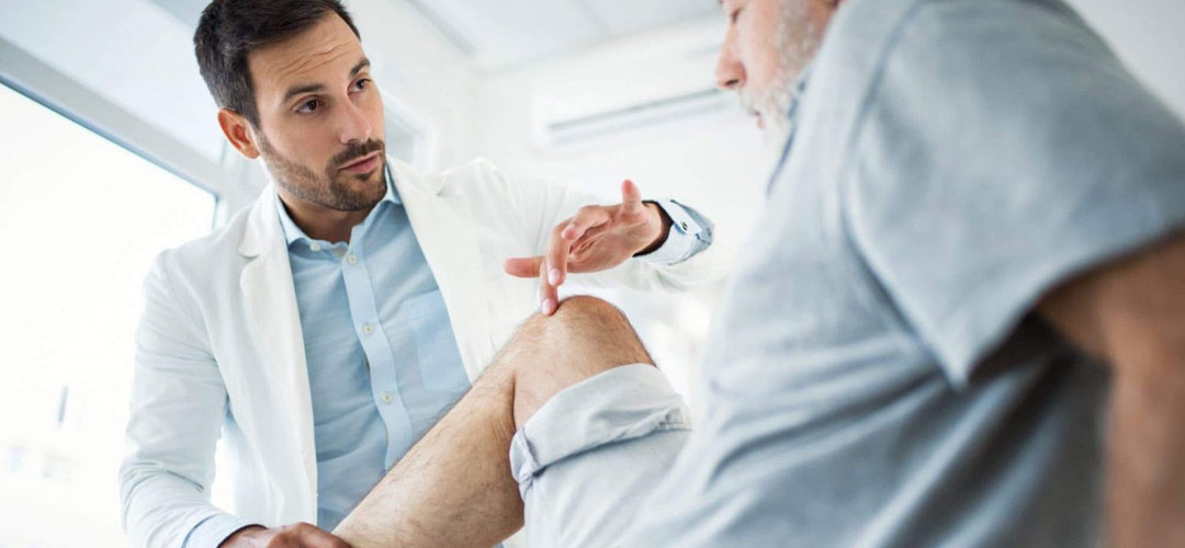 male getting seen by doctor regarding Arthritis