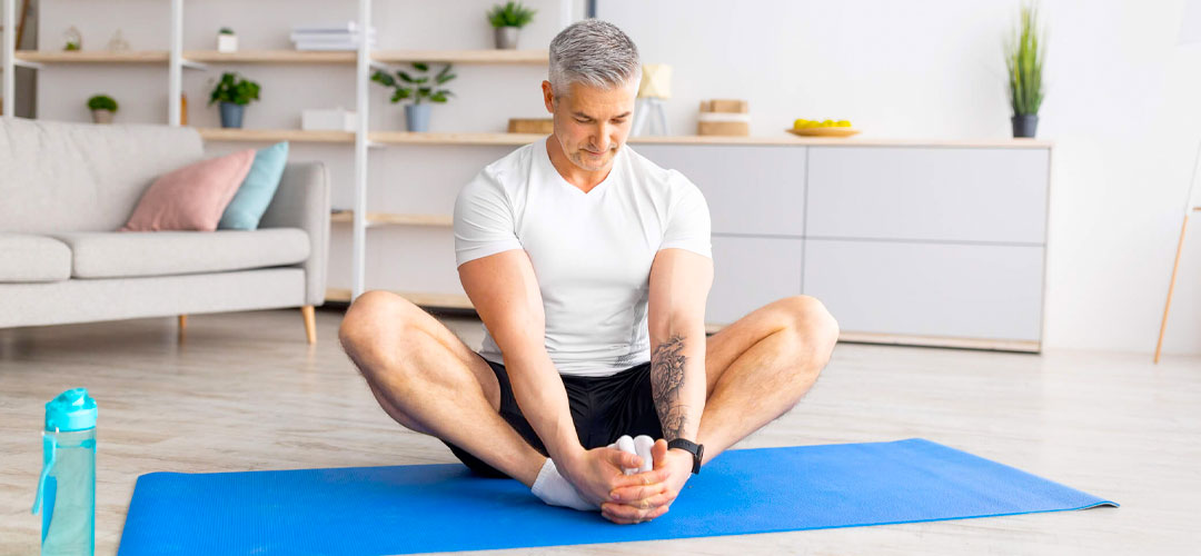 male stretching before work out