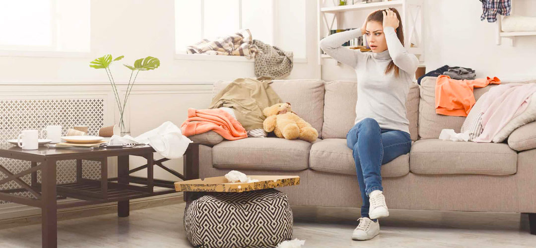 lady in very cluttered home upset