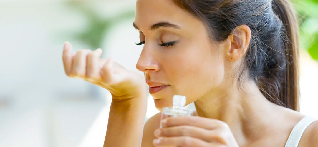 lady being uplifted with the organic scent of the essential oil