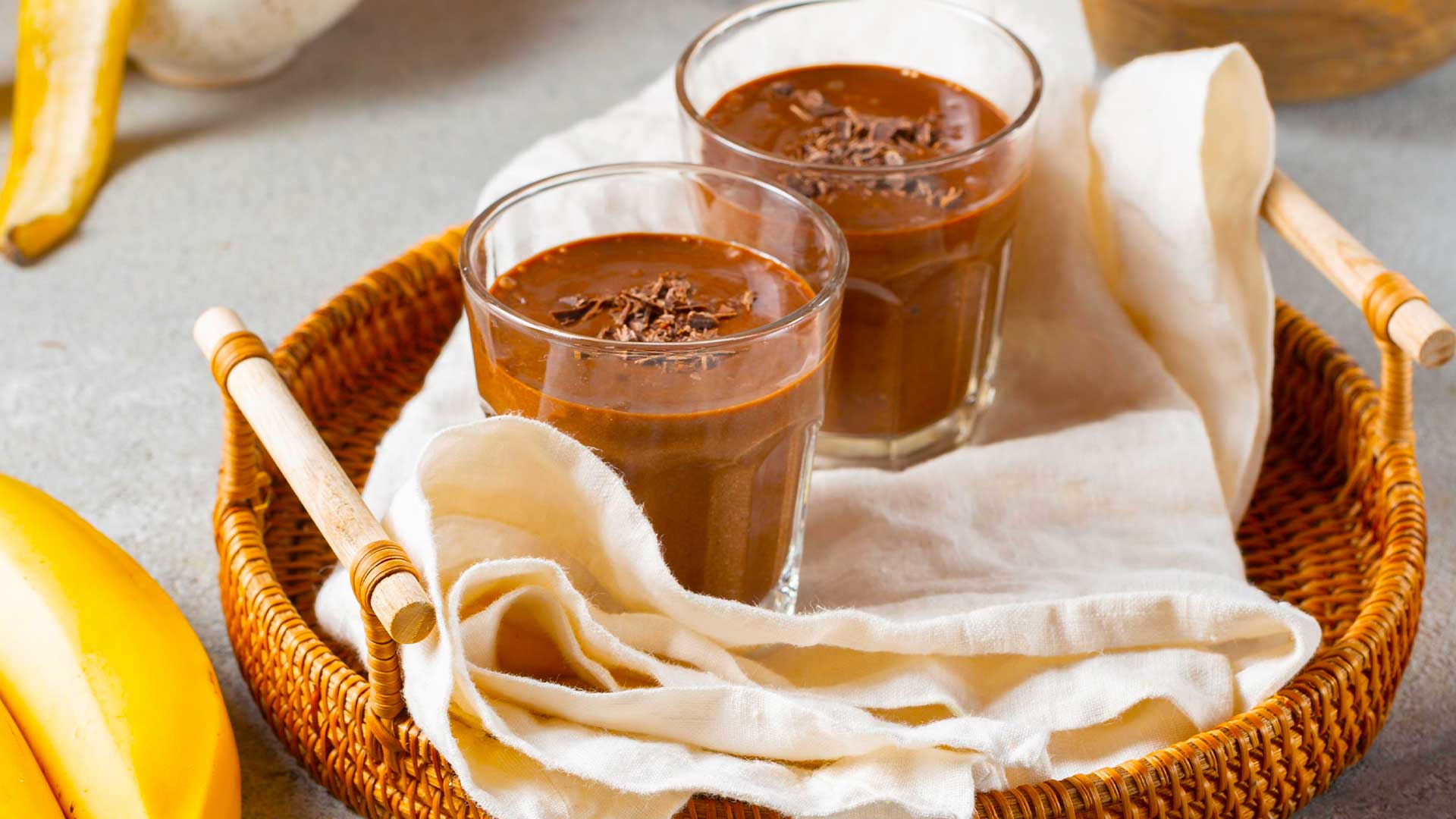 Chocolate Mud Recipe served in glass tumblers on a wicker tray