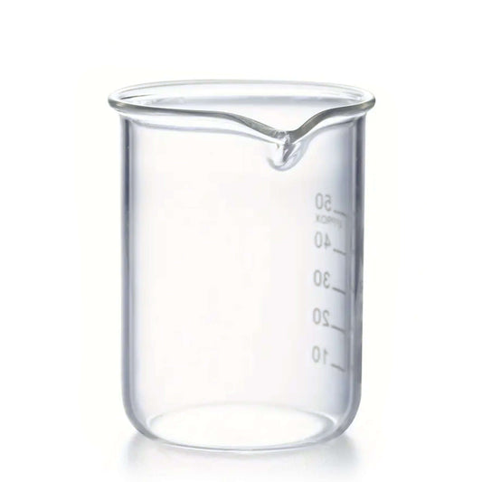 Clear glass beaker with measurement markings on a white background