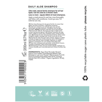 Back label of a Daily Aloe Shampoo bottle with text, barcode, and recycling information.