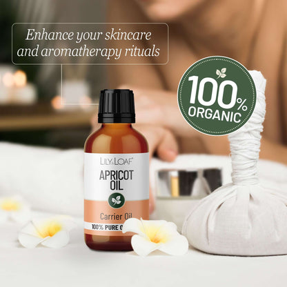 Bottle of apricot oil with a 100% organic label on a blurred background of a spa setting.