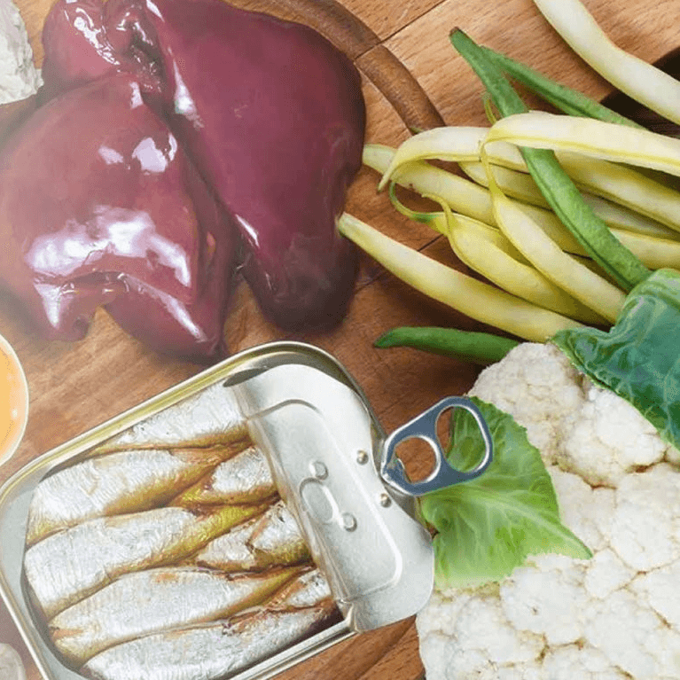 A selection of foods high in vitamin B including liver and sardines