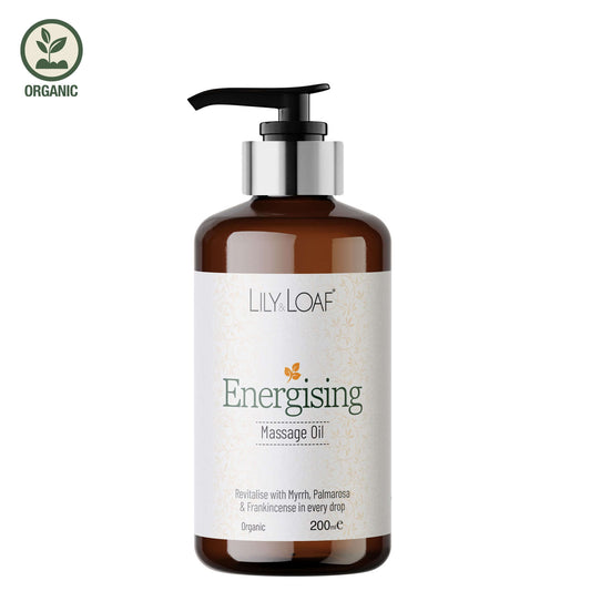 Brown bottle of Lily Loaf Energising Massage Oil on a white background