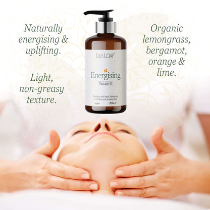 Lily & Loaf Energising Massage Oil bottle with a person receiving a massage on a white background
