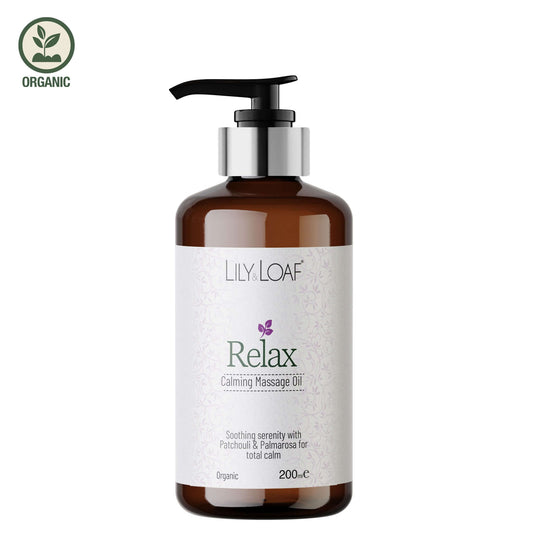 Bottle of Lily & Loaf Relax Calming Massage Oil on a white background