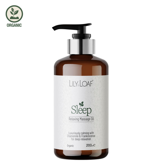 Bottle of Lily Loaf Sleep Relaxing Massage Oil on a white background