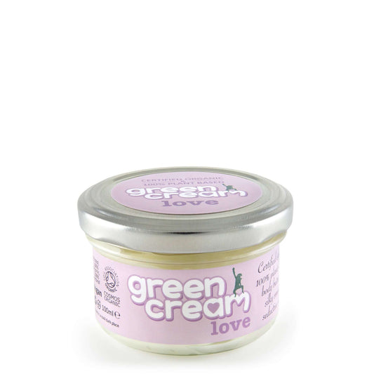 A jar of Green Cream Love body cream with a purple label on a white background.