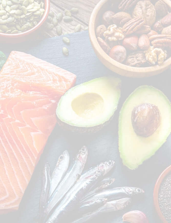 selection of omega rich foods including nuts, fish and avocado