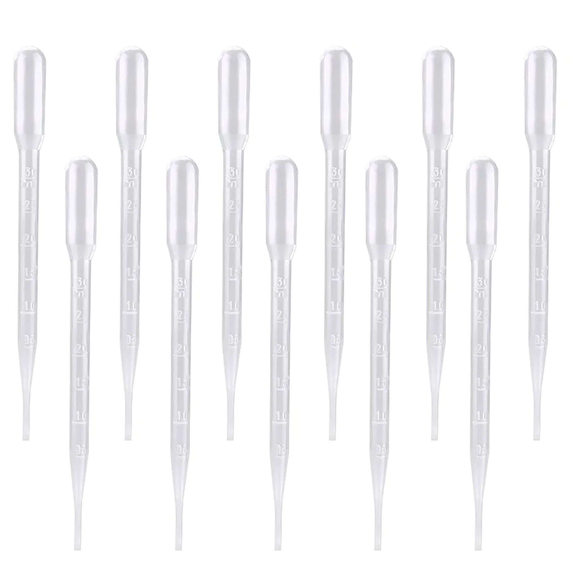 Set of clear pipette tips on a white background