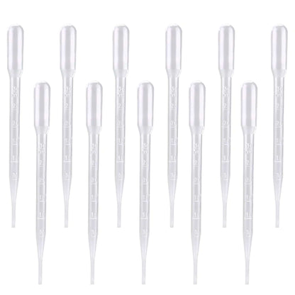 Set of clear pipette tips on a white background