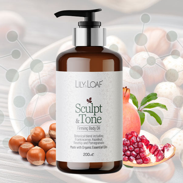 Bottle of Lily & Loaf Sculpt & Tone Firming Body Oil with pomegranate and hazelnut ingredients on a light background