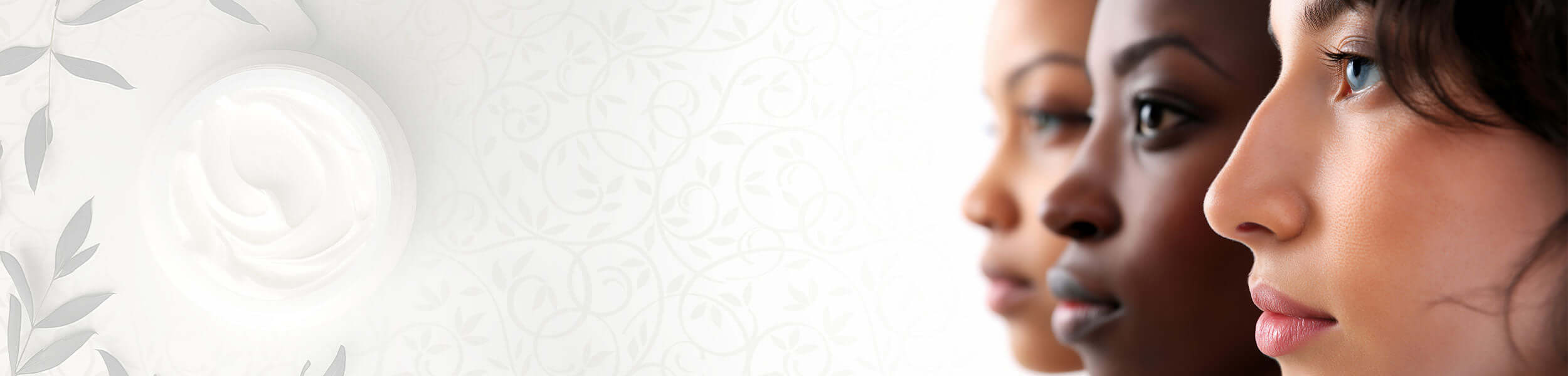 Banner showing three women with clear skin in profile view, alongside a swirl of cream and botanical background, for Green Woman skincare
