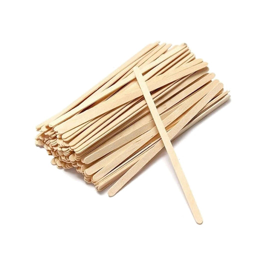 Wooden spatulas on a white background