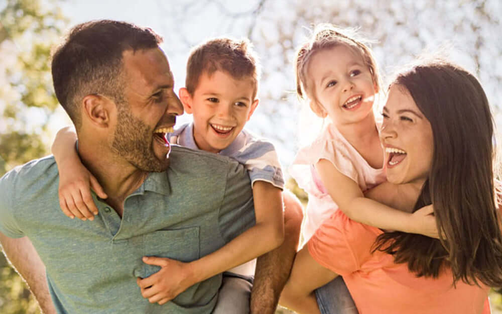 Happy family outdoor fun