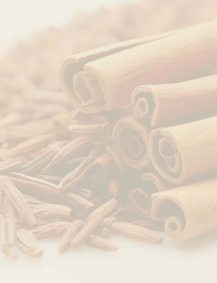 Close-up of Ho Wood sticks and shavings, showcasing their rich texture and deep brown colour