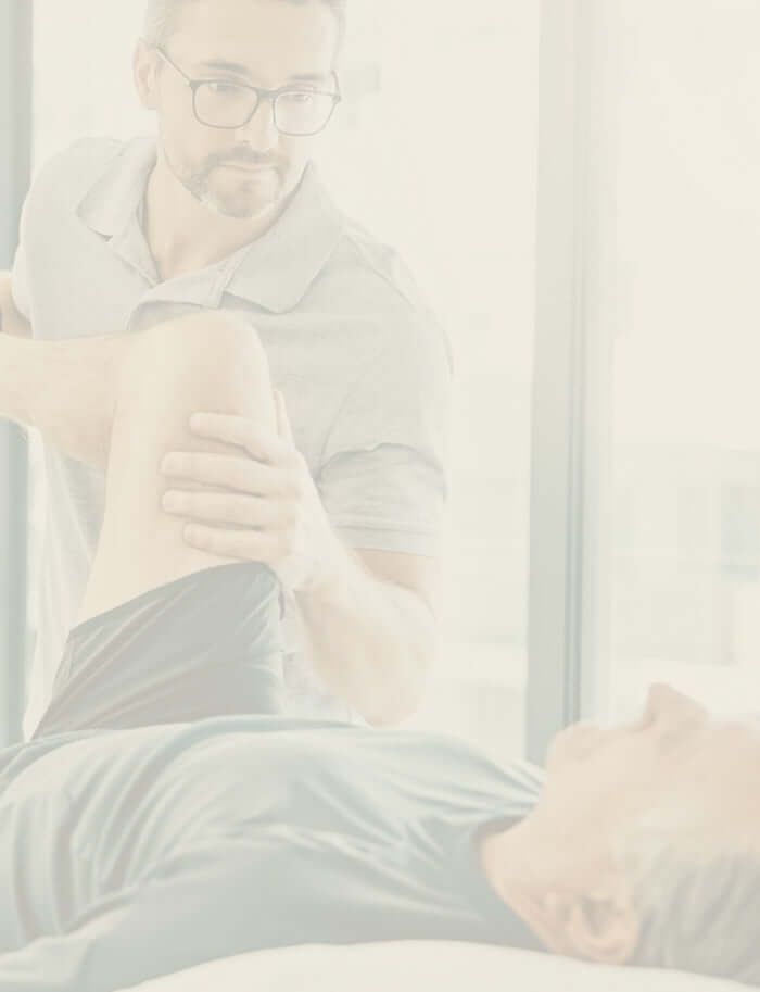 Kinesiologist providing hands-on muscle therapy and energy healing techniques.