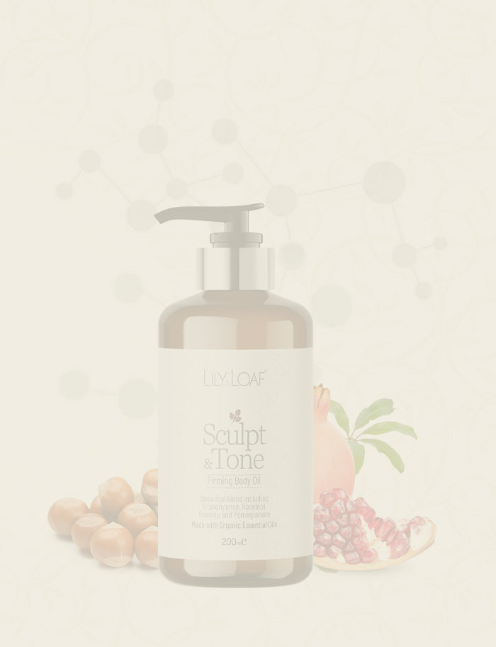 Bottle of Lily & Loaf sculpt and tone body oil on a light background surrounding by ingredients