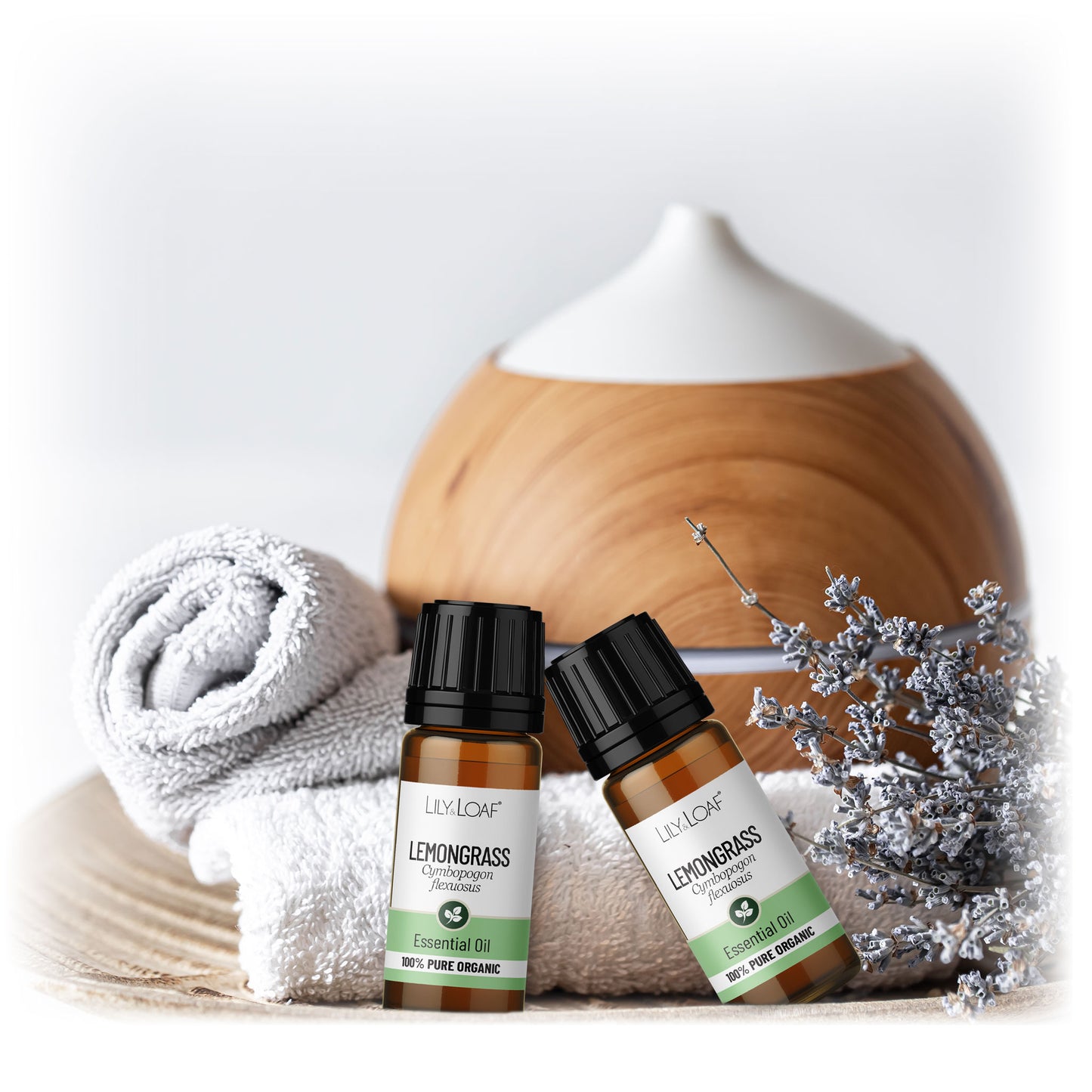 Organic Lemongrass Essential Oil with towel and diffuser